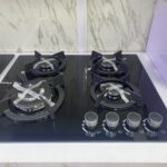 4 burner built in gas hob with 8mm tempered glass thickness and auto ignition 